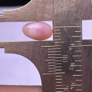 2.3ct Natural Conch Pearl, light pink and white in a Baroque Shape.