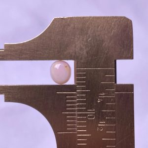 0.9ct Natural Conch Pearl with Baroque Shape and Light pink spotted