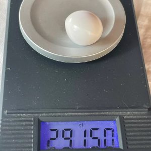 29,1 ct Natural Conch Pearl, white color and round shape with cracked