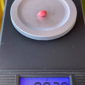 0.9ct Dark Pink Natural Conch Pearl , with tear shape and flame