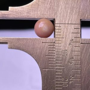 2.1ct Natural Conch Pearl in a button shape with pink spotted (pink and brown)