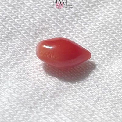 7- 0.9ct Dark Pink Natural Conch Pearl , with tear shape and flame