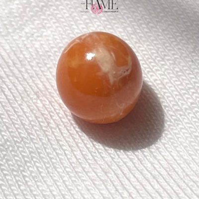8- 5.4ct Orange Natural Conch Pearl With Perfect Round Shape.jpg