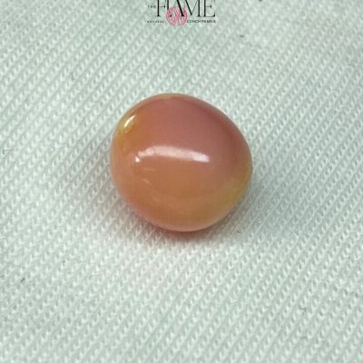 8- 8.0 ct Natural Conch Pearl, pink and yellow spotted color, round shape