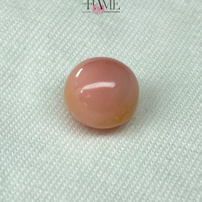 9- 8.0 ct Natural Conch Pearl, pink and yellow spotted color, round shape